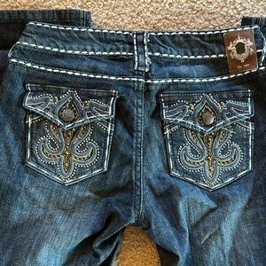 Cello jeweled flap pocket bootcut denim jean
